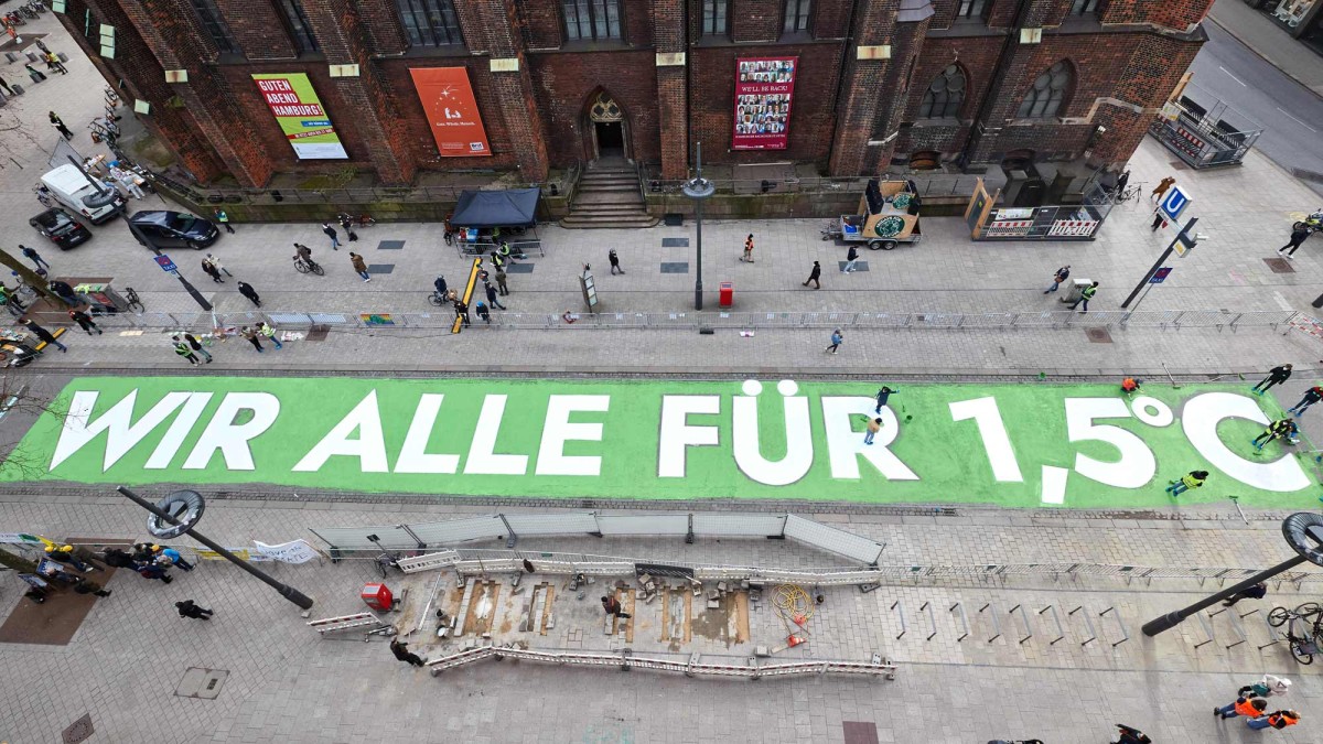 Straßengraffiti "Wir alle für 1,5°C" in Hamburg